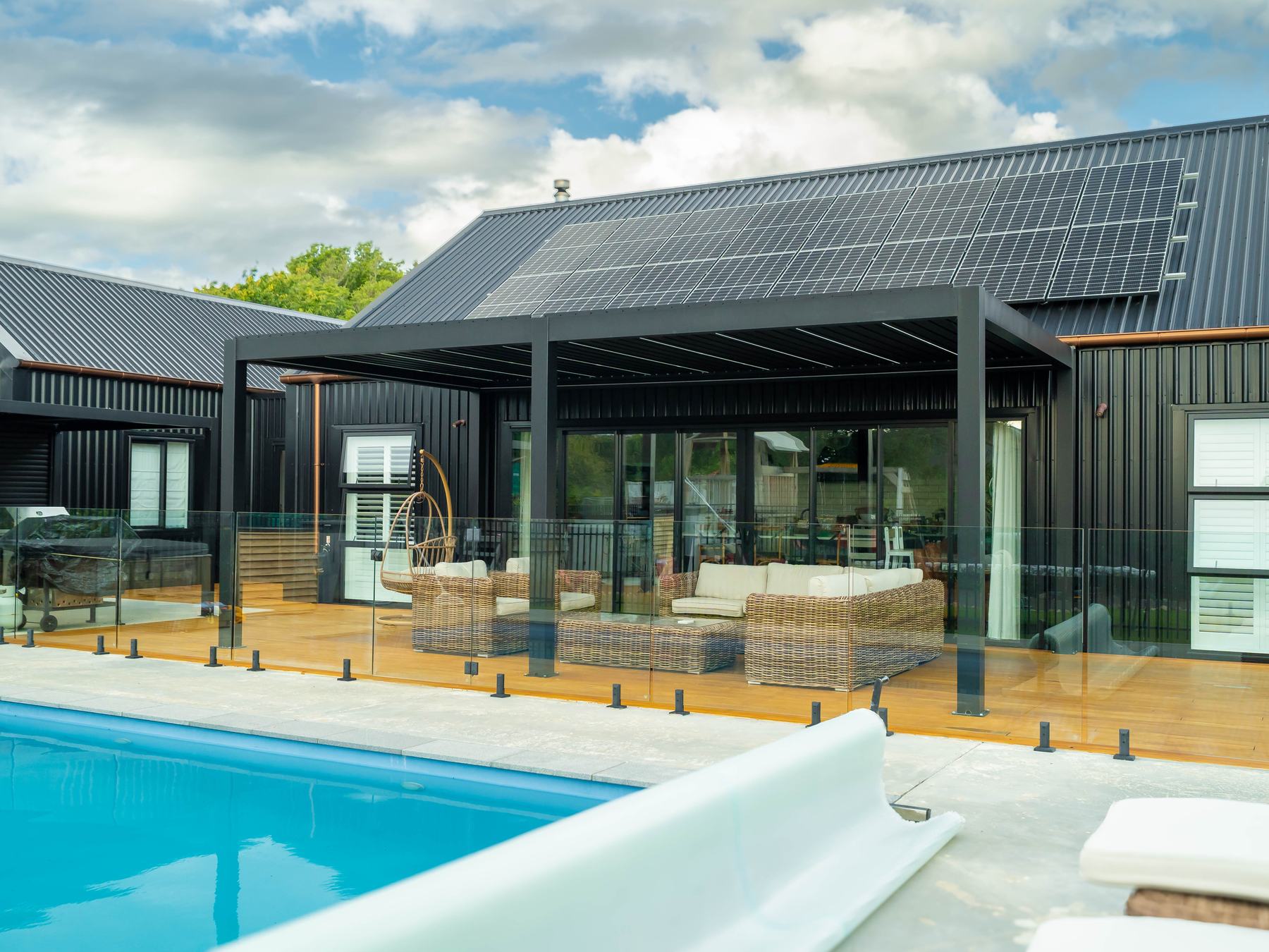 Impact Outdoors louvre roof creating a sheltered place to gather